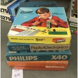 A Philips x40 radio electronics kit, a Radionic kit, a photography kit & Pionier junior kit.
