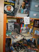 Five shelves of books including The Prisoner, Dangerman etc.