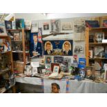 A massive lot of JFK related items including photographs, posters, books, videos, slides,