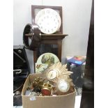 A large quantity of clock parts, empty case, faces and 2 starburst clocks,