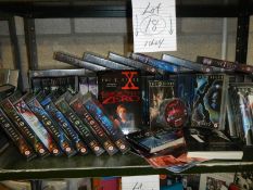 A shelf of X Files videos.