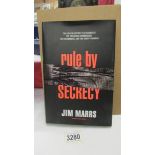 "Rule By Secrecy" by Jim Harris, first edition, signed by the author and in mint condition.