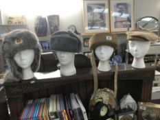 4 Russian style hats, heads not included.