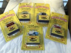 A full set of all 5 Matchbox original models sealed in packs