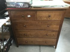 A 2 over 3 oak chest of drawers. ****Condition report**** Height 88.5cm. Width 90cm.