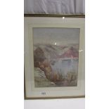 A framed and glazed watercolour mountain and lake scene signed H J Thurnoll 1996 (extensive foxing).