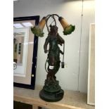 A figural 2 lamp table light