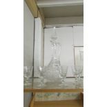 A cut glass claret jug and a set of 6 glasses.