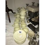 A large quantity of old pottery jugs, saucers etc.