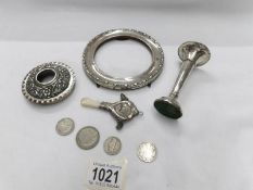 A mixed lot of hall marked silver items including babies rattle/teether, coins, spill vase etc.