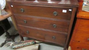 A mahogany 3 drawer chest.