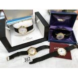 A boxed Tissot watch with book, another Tissot watch,
