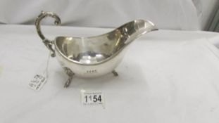 A hall marked silver sauceboat (only 72% silver).