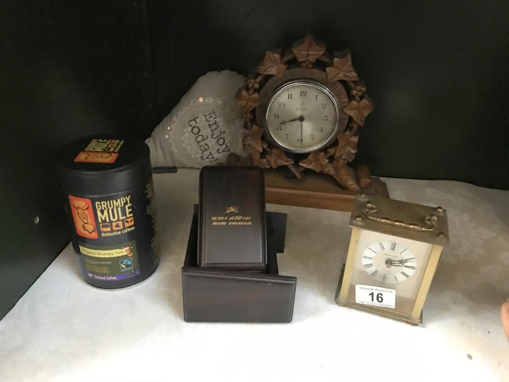 A carved wood mantle clock etc.