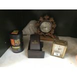 A carved wood mantle clock etc.