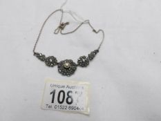 A vintage silver marcasite necklace,