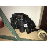 Two pairs of binoculars