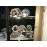 2 shelves of collectors plates & other items