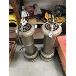 A pair of old paraffin heaters