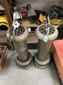 A pair of old paraffin heaters