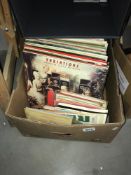 A quantity of LPs and 45 rpm records and an empty case