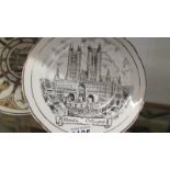 A Wedgwood Shakespeare plate and a Lincoln Cathedral plate.