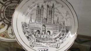 A Wedgwood Shakespeare plate and a Lincoln Cathedral plate.