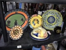 A tray of hand painted plates etc.