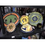 A tray of hand painted plates etc.