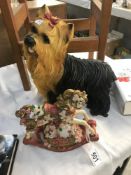 A Yorkshire Terrier figure and a rocking horse figure.