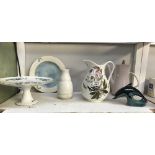 A Poole pottery plate, vase, dolphin, coffee pot,