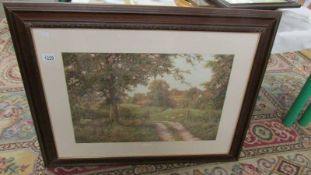 A framed and glazed watercolour entitled Dell Farm signed R D Beaton.