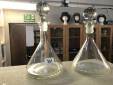 2 conical glass decanters