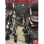A wheelchair in good order ****Condition report**** Small rear solid tyre wheels.