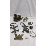 A mixed lot of interesting metal items including dragon head tortoise, lizards etc.