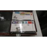 Three albums of Royal Mail first day covers, 1994 to 2006.
