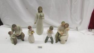 5 Willow Tree figurines.