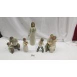 5 Willow Tree figurines.