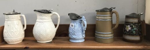 5 jugs with pewter lids