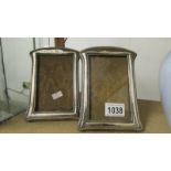 A pair of hall marked silver photograph frames. (Size of the frames: height 17cm x 12.