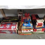 2 boxes of toys including Evel Knievel, scramble van, Corgi school of motors & games etc.