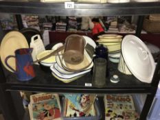 A shelf of enamelware