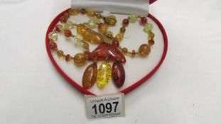 A Baltic amber necklace with amber drop, 60 grams.