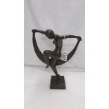 A Bronze nude dancing figure.