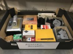 A box of camera accessories by Yashica, Arguet, Kodak etc.