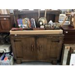 An oak buffet sideboard.