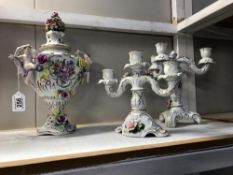 A continental porcelain lidded urn & pair of candelabara (some flowers A/F)