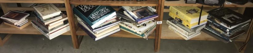 Two shelves of antiques collectors books