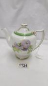 A Royal Doulton teapot for one person, 4.5" tall.