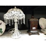 A decorative table lamp & a lidded urn